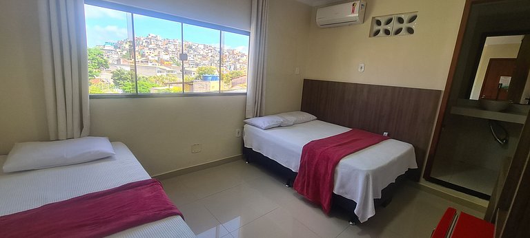 Suíte Quádrupla com vista da praça