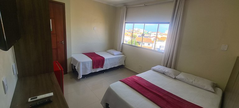 Suíte Quádrupla com vista da praça