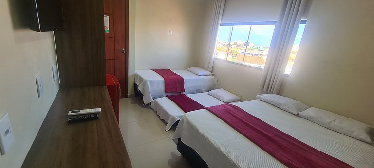 Suíte Quádrupla com vista da praça