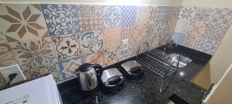 Suíte 6 Quádrupla com Vista da Praça