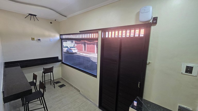 Suíte Quádrupla com vista da praça